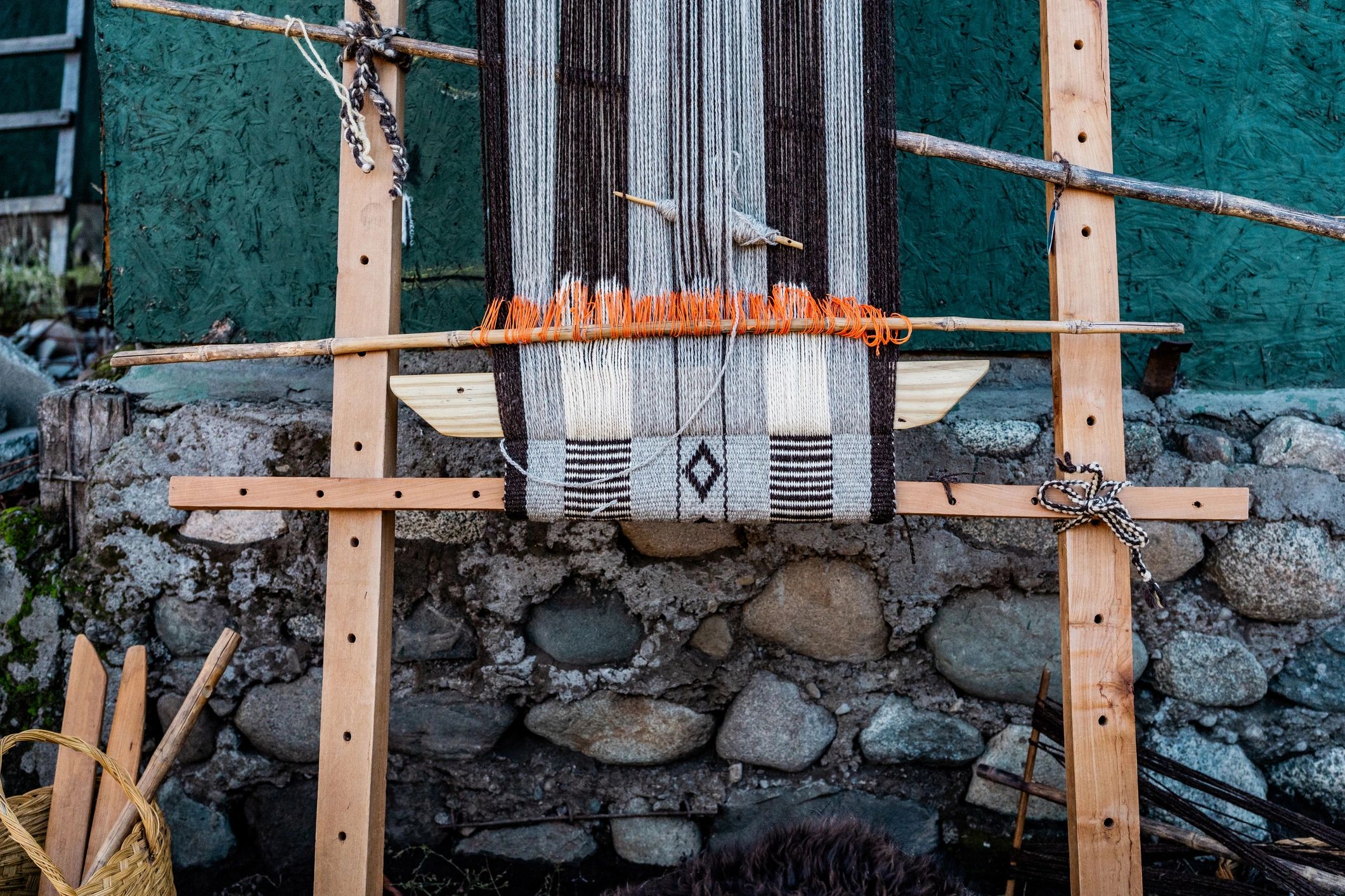 Close-up of natural fiber weaving on a loom